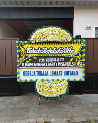 Papan Bunga Duka di Bukit Sangkal